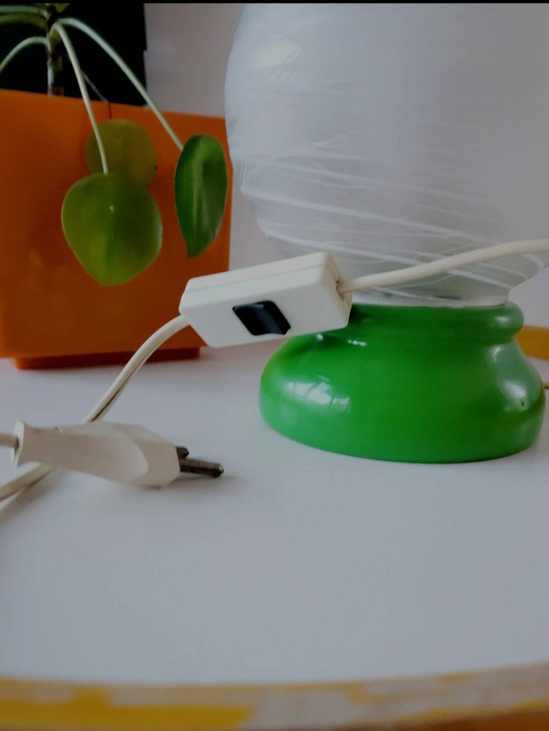 Vintage French table lamp with glass opaline shade and wooden green lamp base.