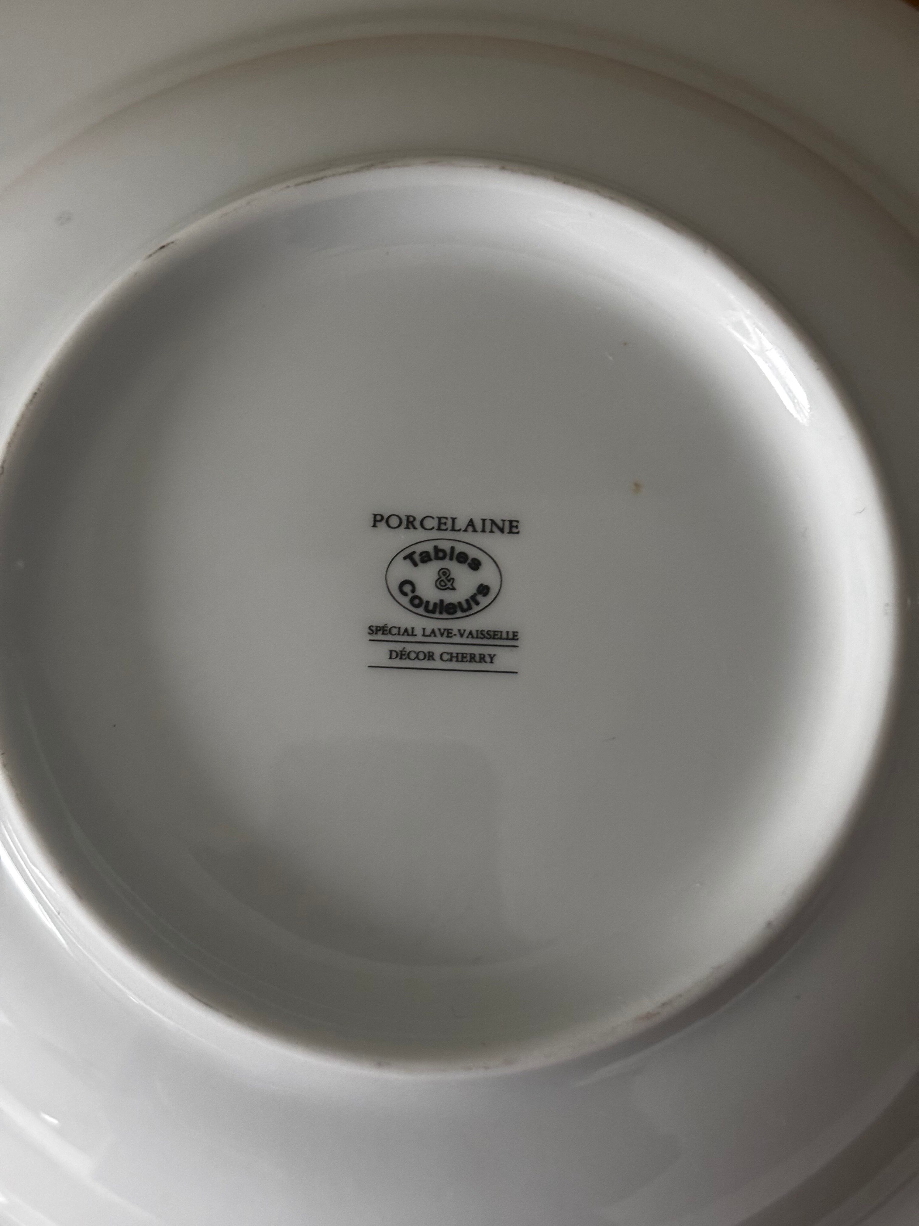Set of 5 deep porcelain plates in cherry table colours.