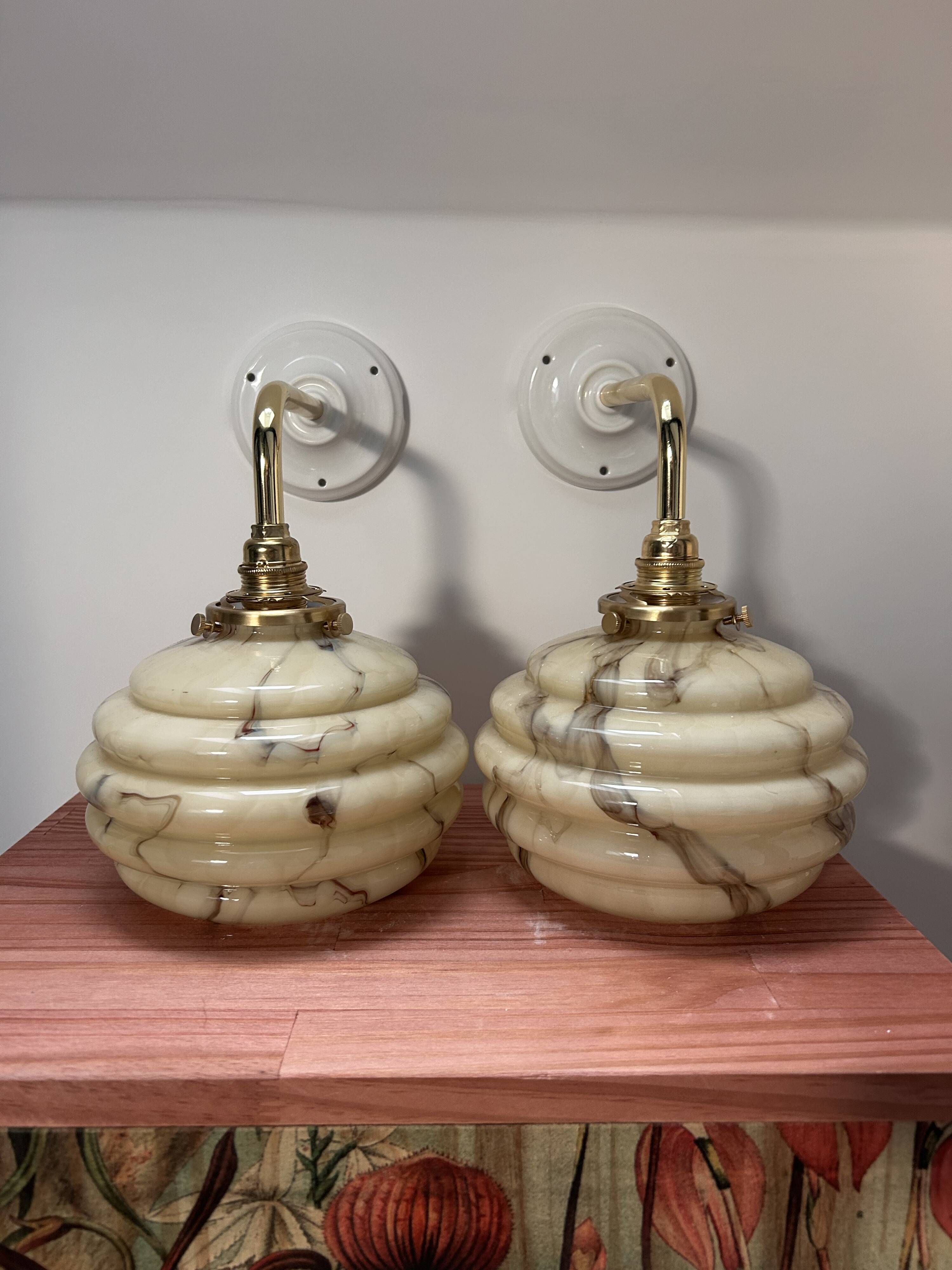Pair of vintage marbled opaline globe wall lights