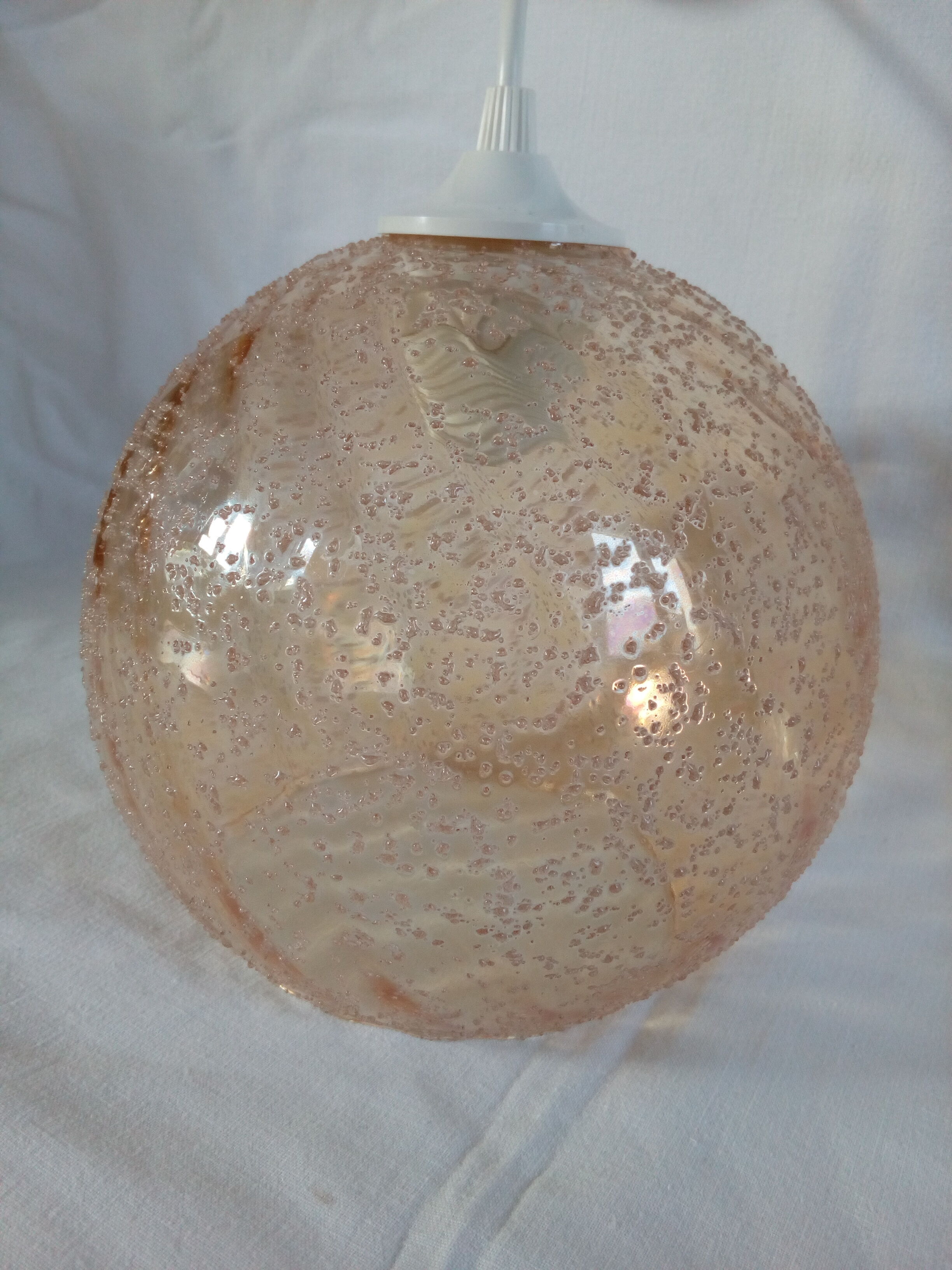 Hanging lamp globe ball in granular amber glass