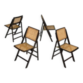 Ensemble de quatre chaises pliantes vintage avec assise et dossier en cannage viennois.