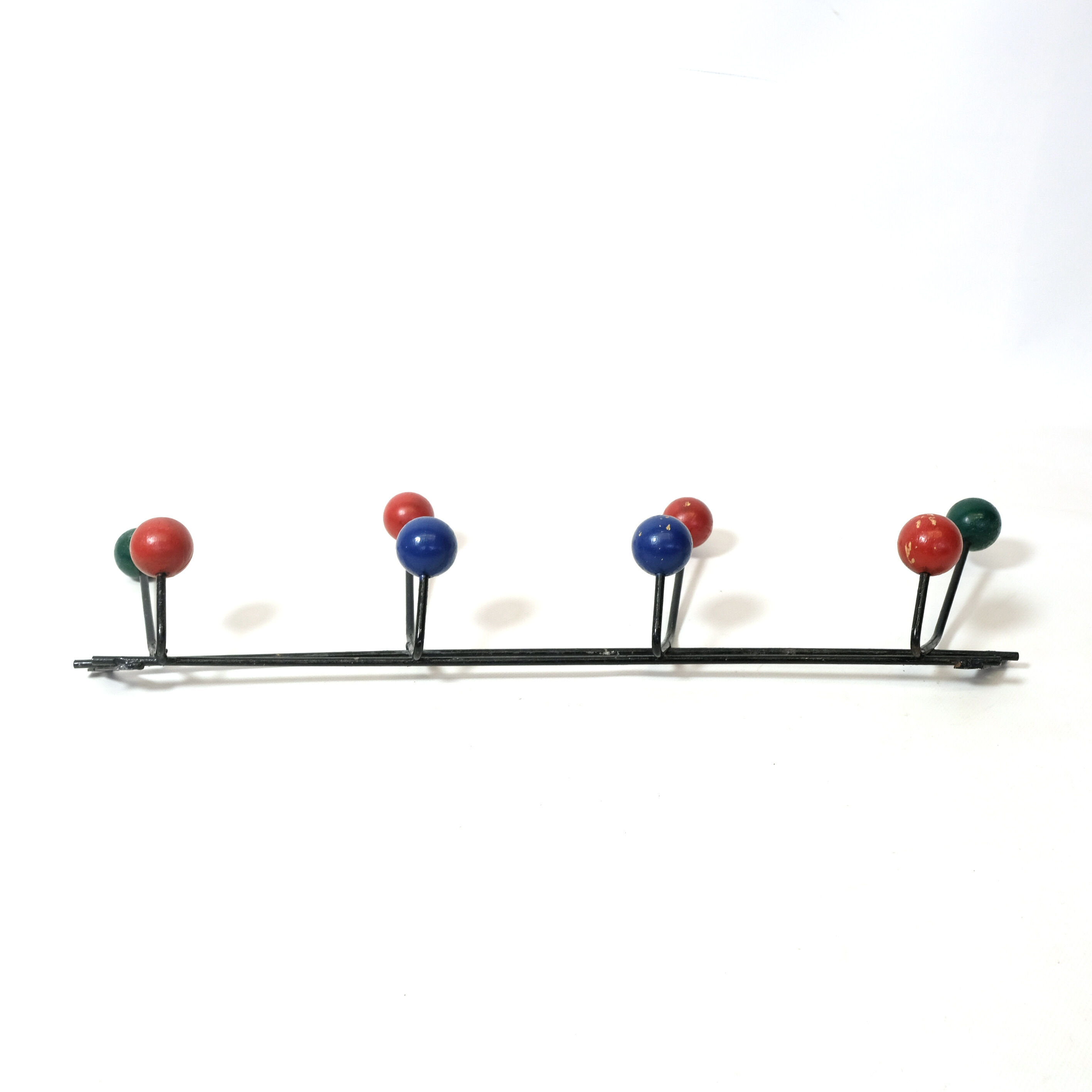 Multicolored wooden and metal coat holder