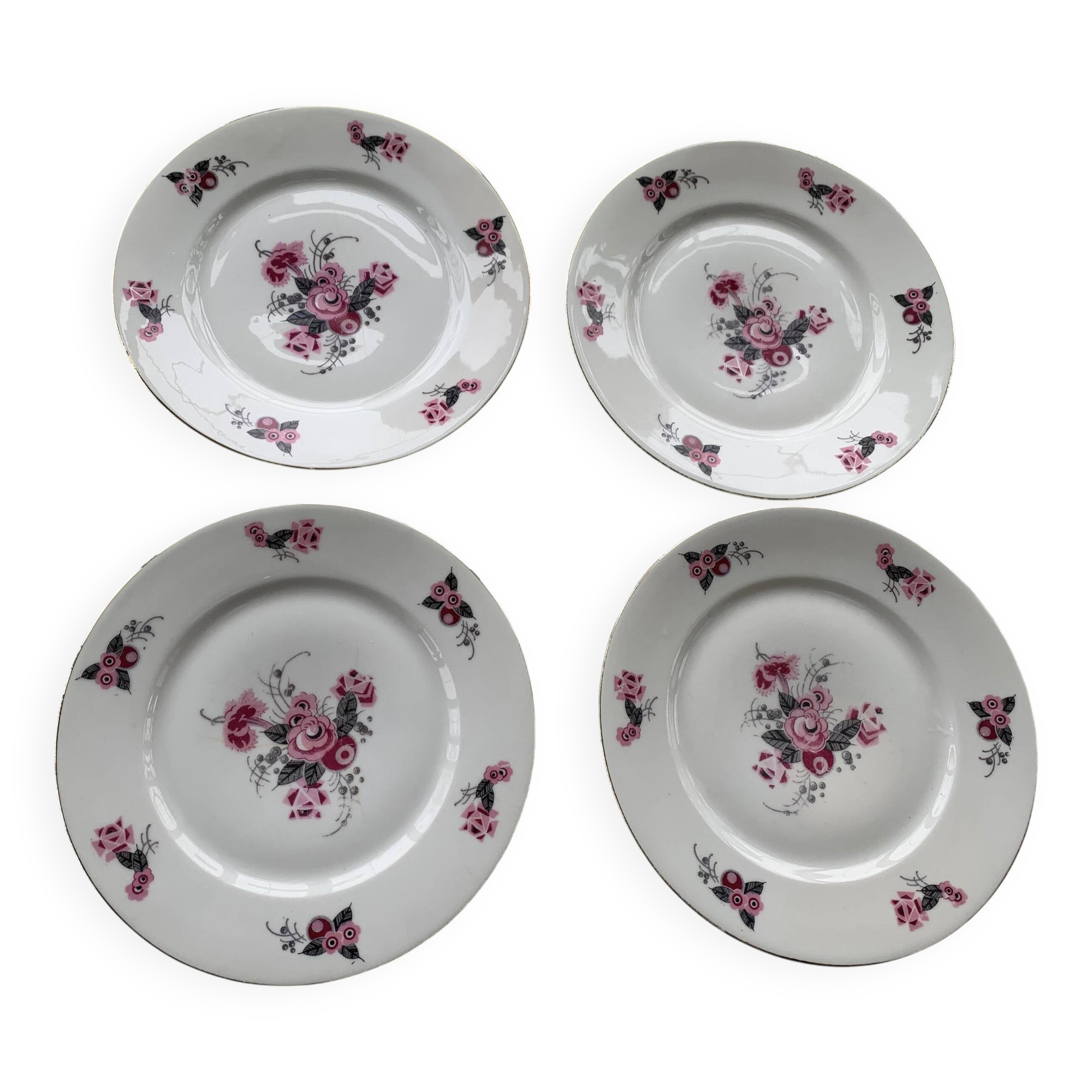 Set of 4 flat plates, in art deco porcelain