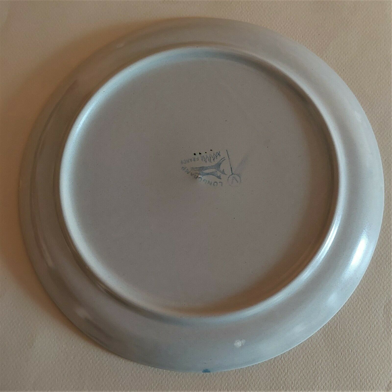 Vintage flat plate in sandstone marked Longchamp
