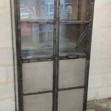 Riveted metal display cabinet library