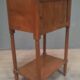 Curtained bedside table from the nineteenth century.