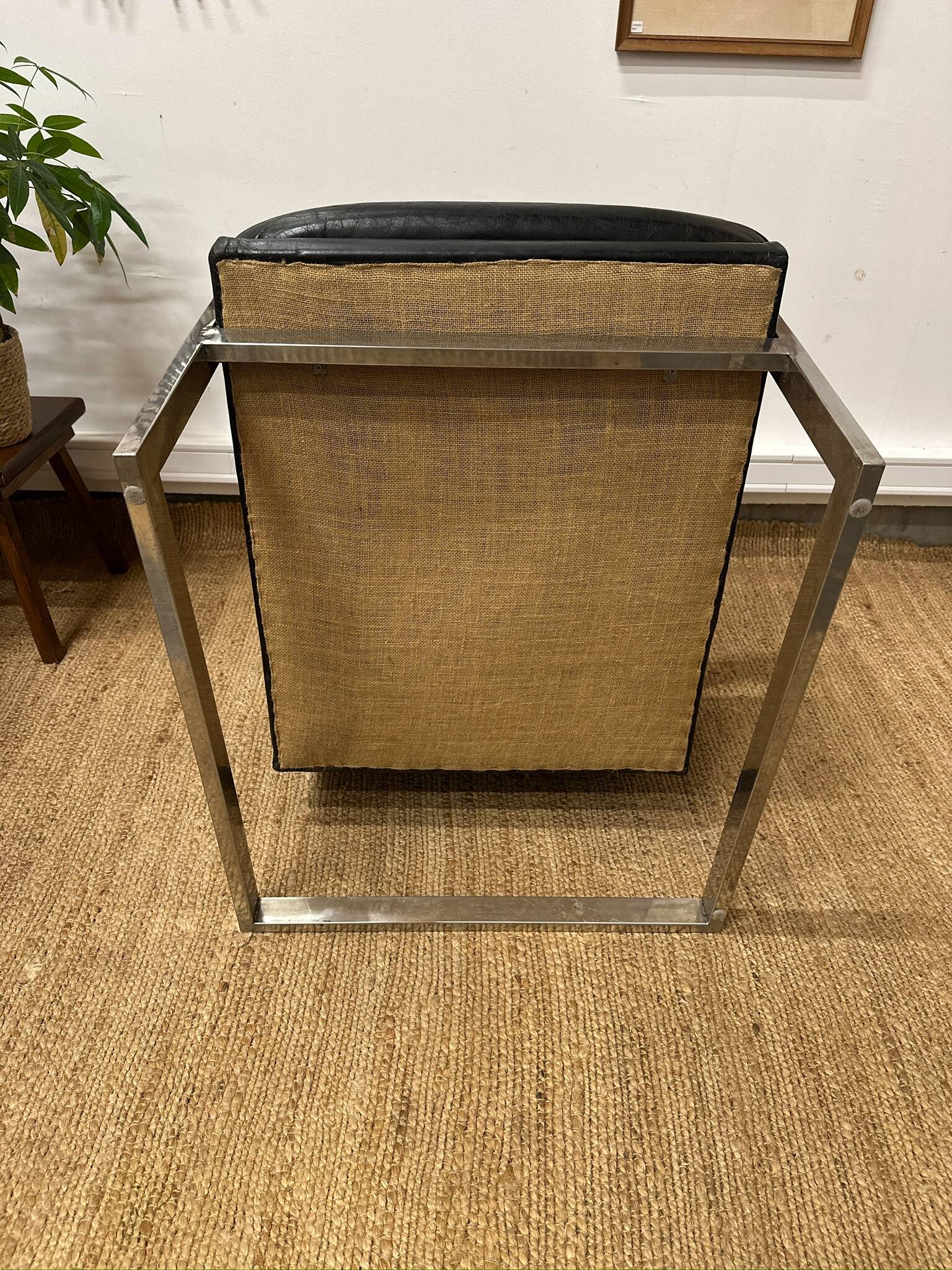 Vintage 1970s black leather armchair – metal frame