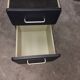 Metal box with used vintage keyless casters
