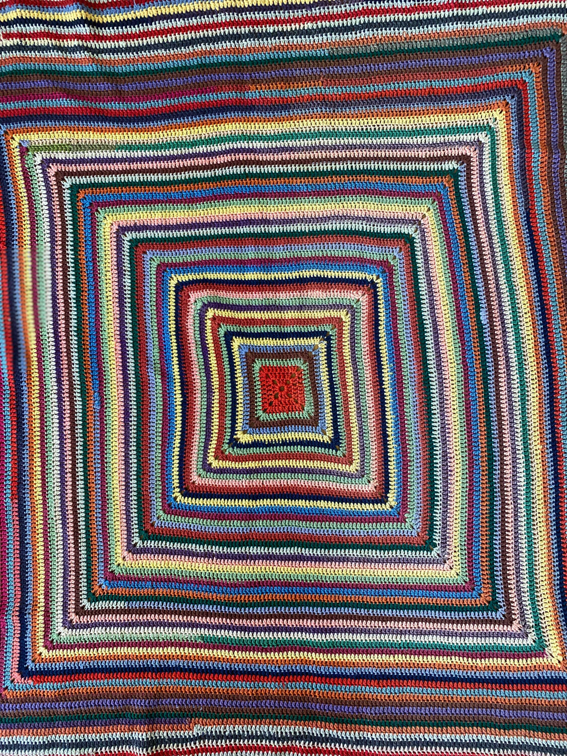 Hand crocheted wool blanket plaid