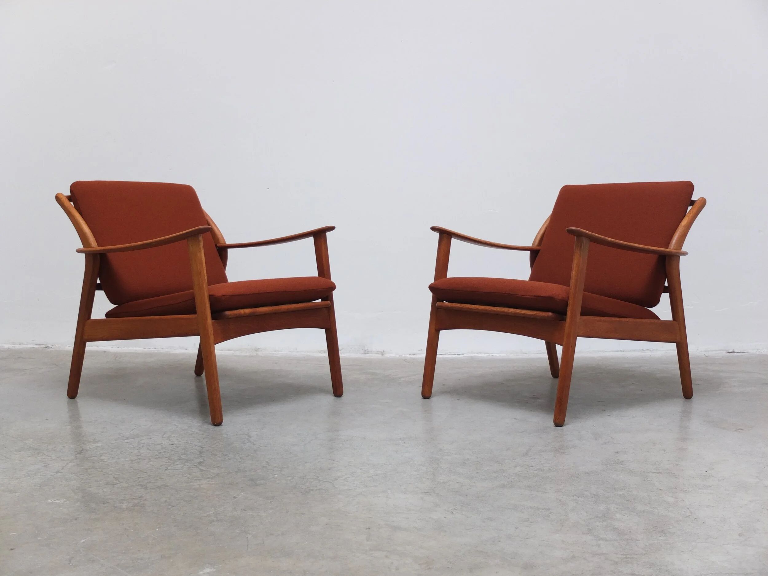 Danish pair of easy chairs in oak by Niels Koefoed, 1960s