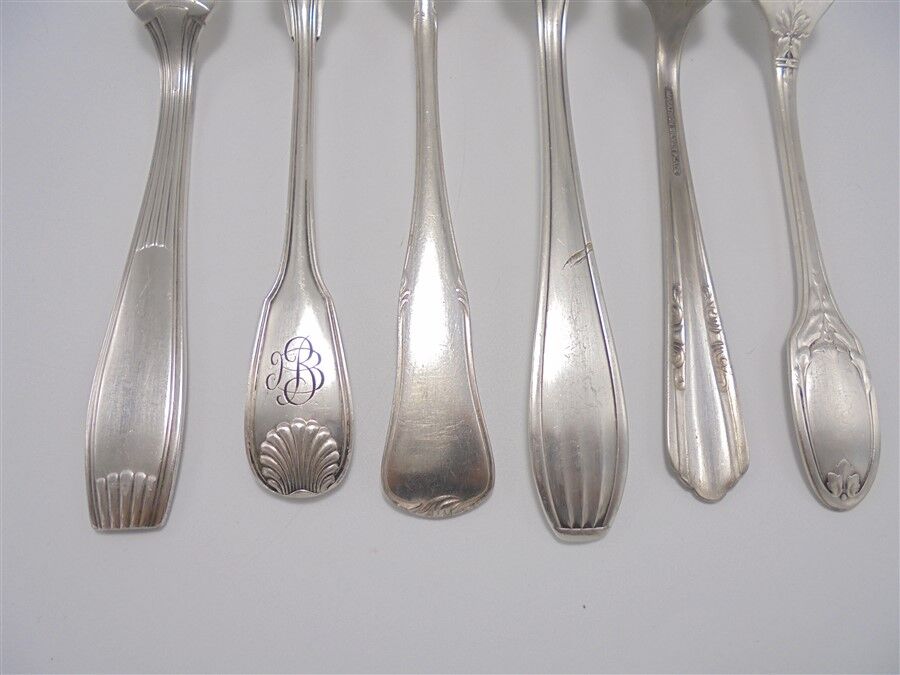 6 old mismatched forks