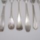 6 old mismatched forks