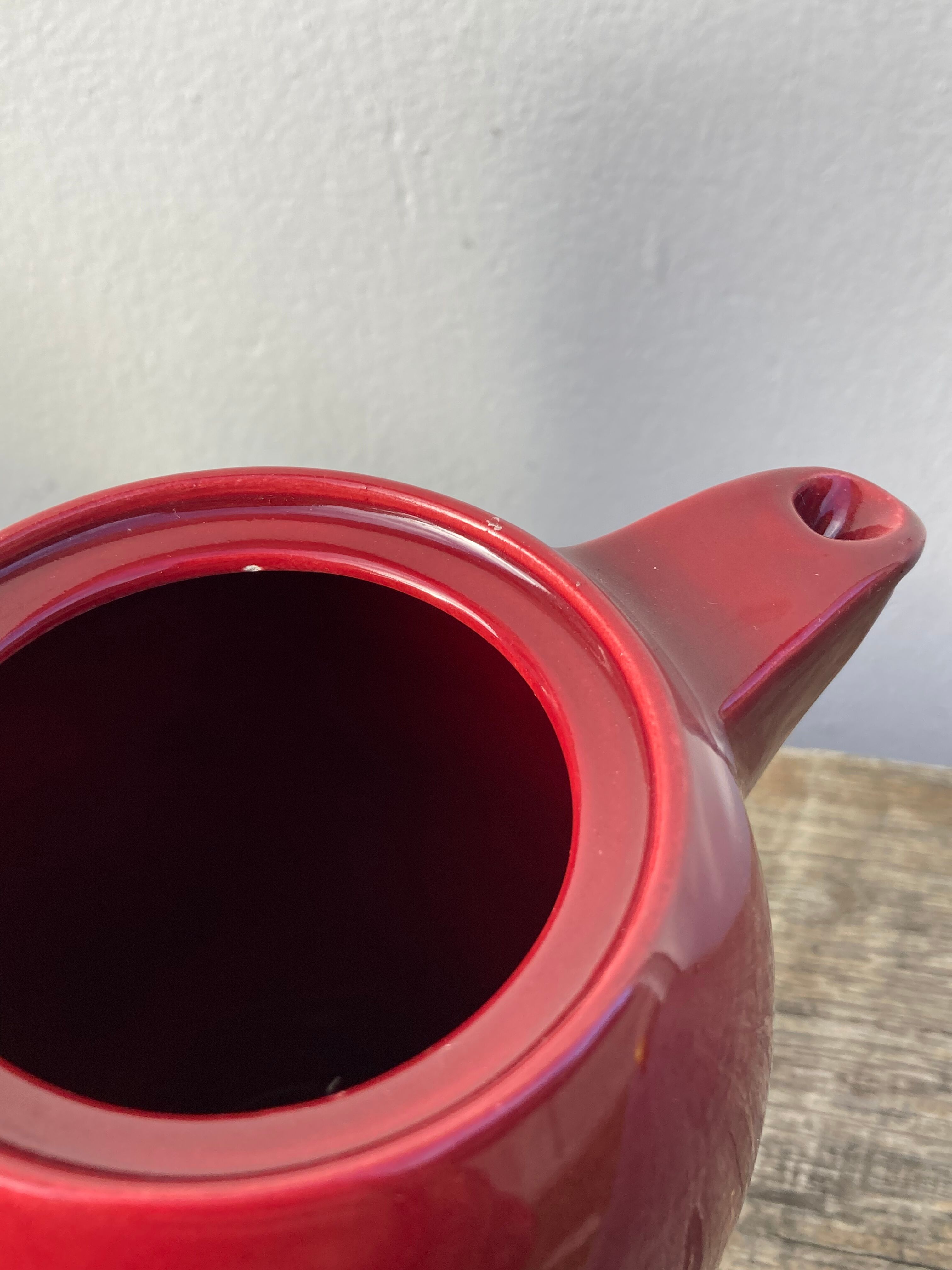 Vintage burgundy red teapot