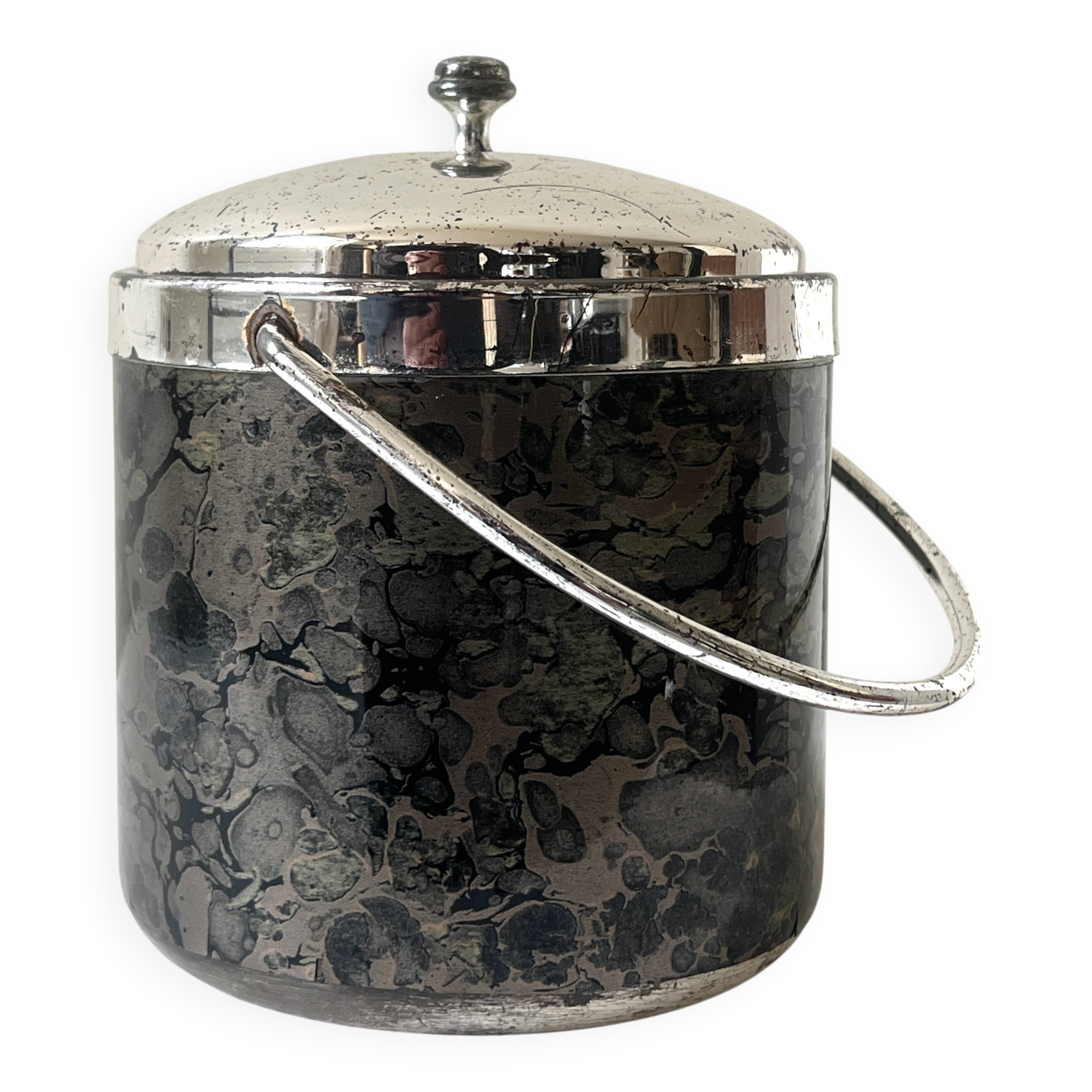 Vintage chrome metal ice bucket with black marbled design, 1970s style.