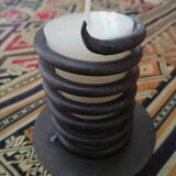 Spiral metal candle holder spring with candle, bronze appearance