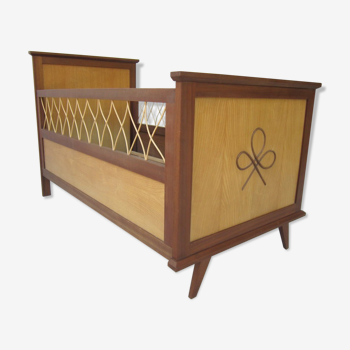 Wood and rattan child bed