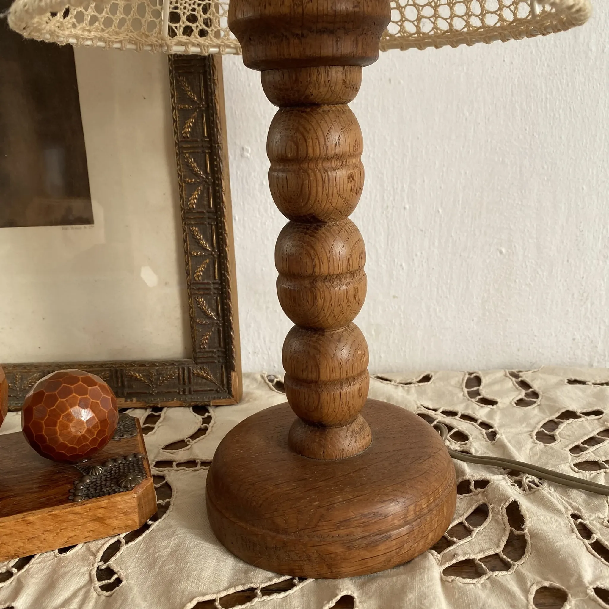 Wooden turned bedside lamp with lace