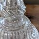 Legras candlestick in molded glass with faces in relief, vintage carafe