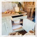 Carved flowered sideboard