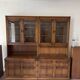 Ercol library cabinets storage England in elm