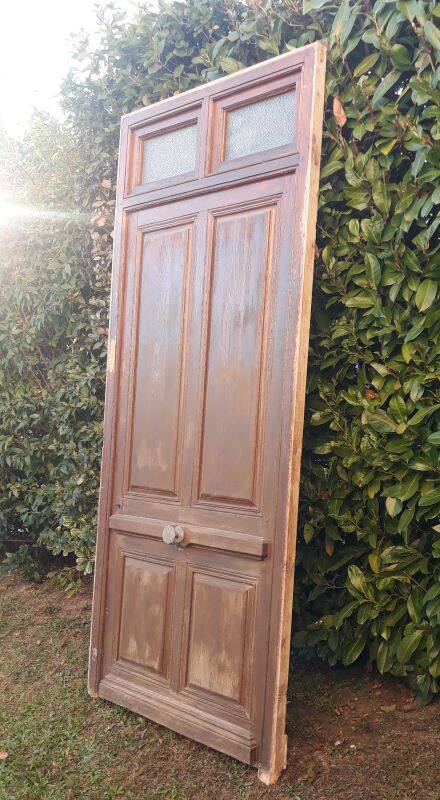 Front door and its frame, translucent glass windows, early 20th century