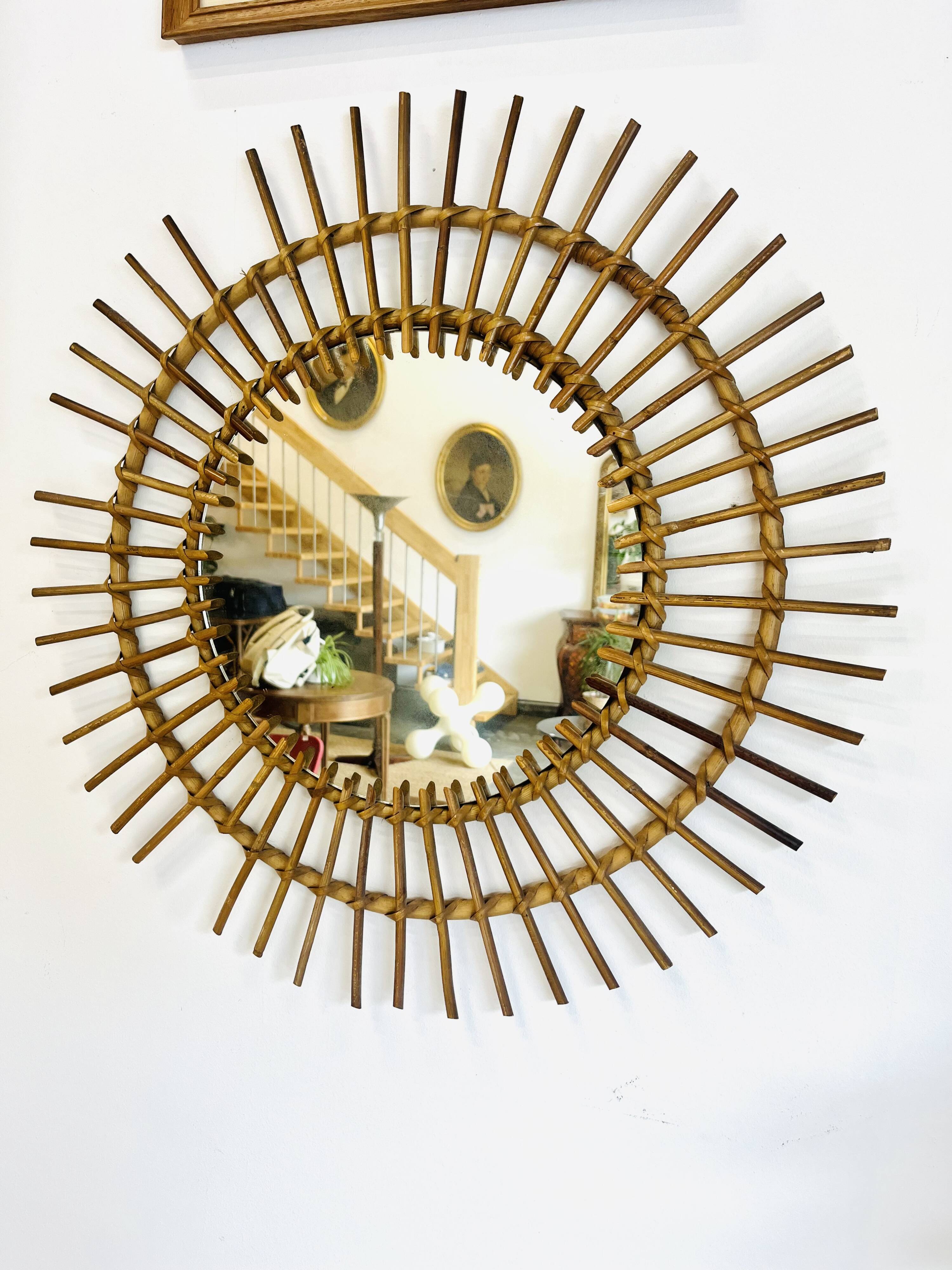 Vintage woven rattan sun mirror from the 60s