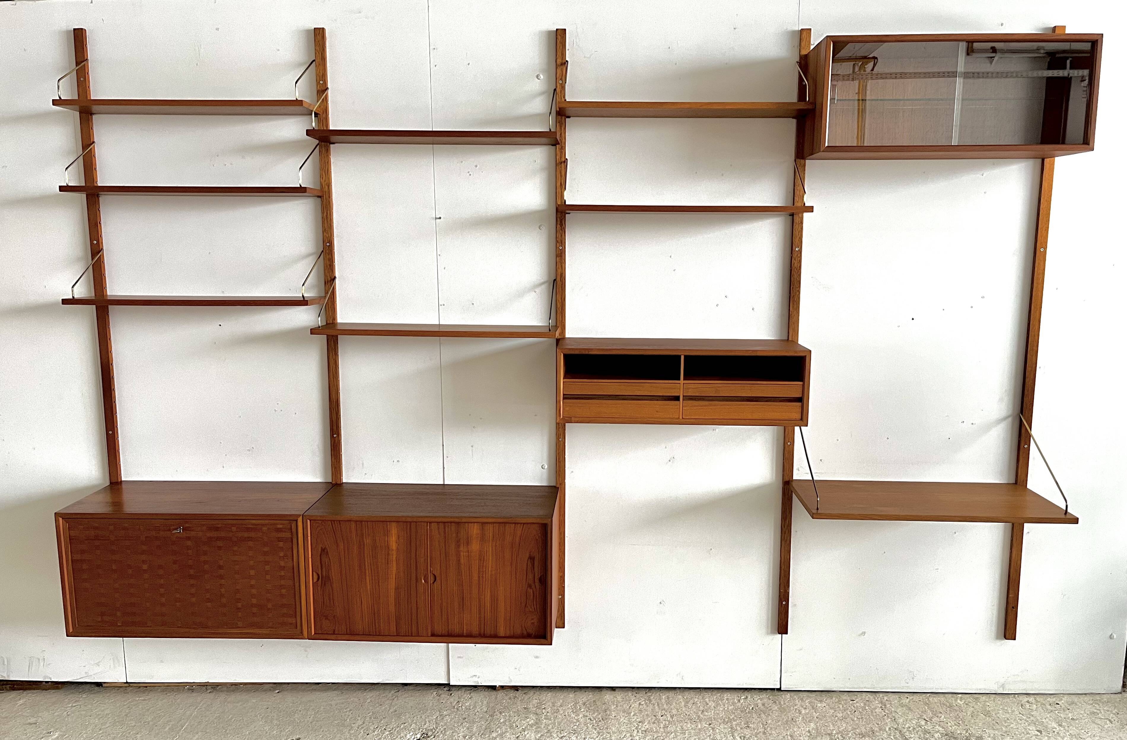 A wall unit with 4 compartments by Poul Cadovius, Denmark, 1960s.