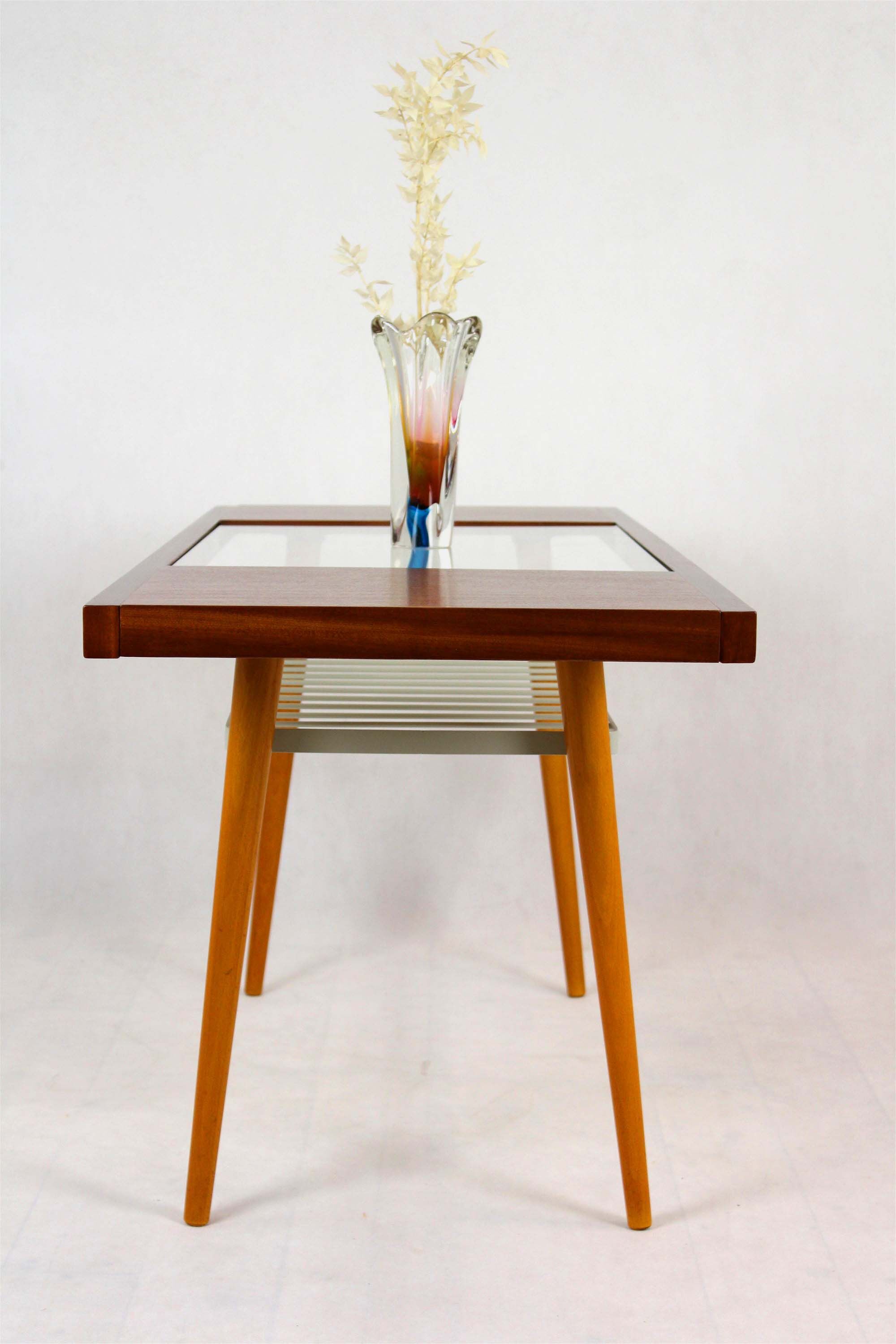 Glass top coffee table from Jitona, 1960