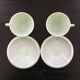 Pair of almond green opaline cups
