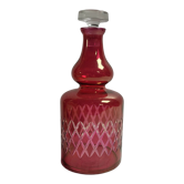 Red chiseled decanter