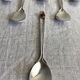 Art Nouveau metal and amber spoons