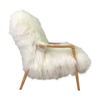 Fauteuil en peau de mouton blanche