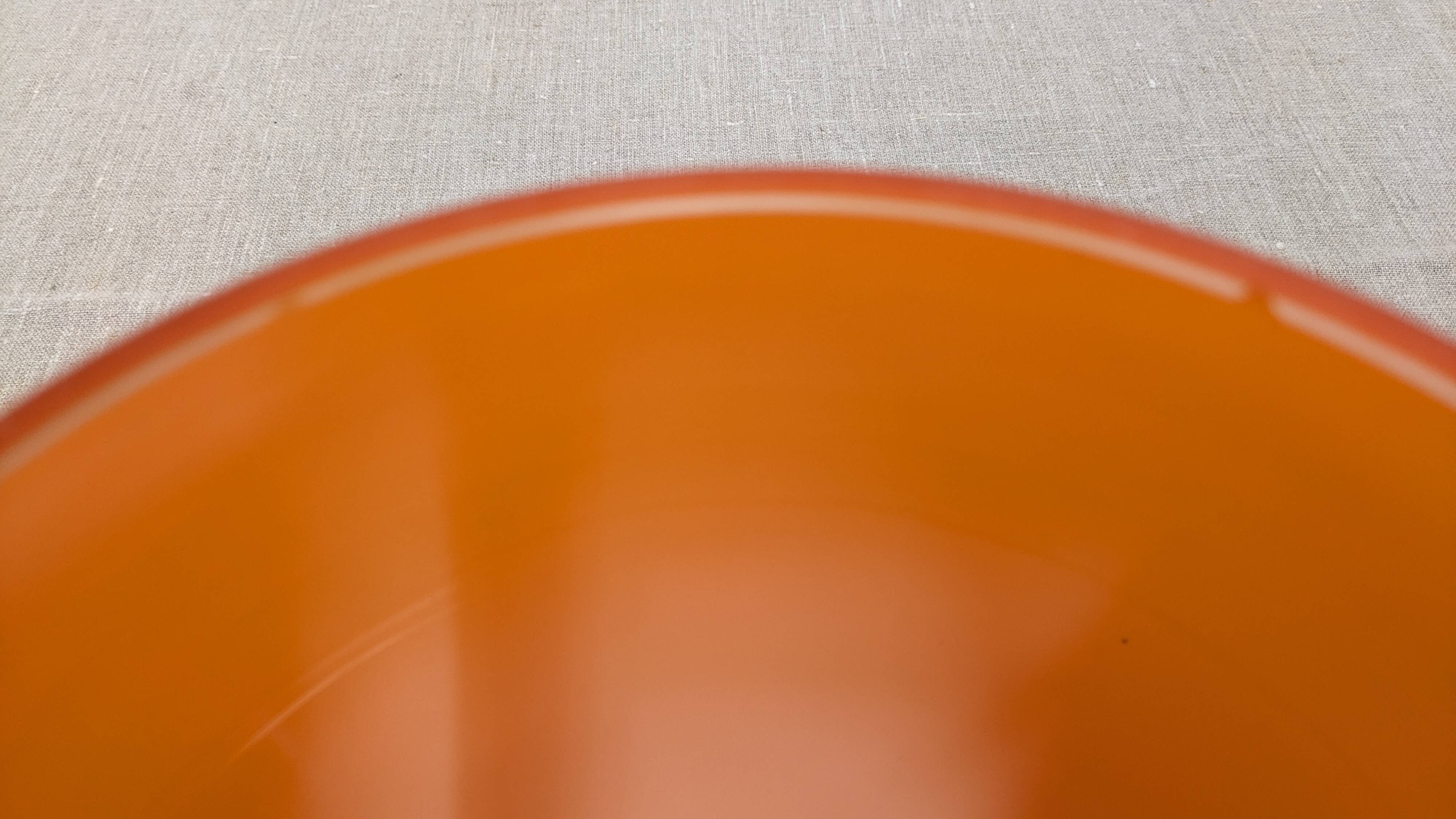 Pair of orange opaline ball pendants by Parscot, France circa 1970.