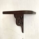small old openwork wooden wall shelf