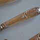 12 silver metal table knives 25.5 cm