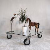 Beautiful designer glass coffee table on wheels
