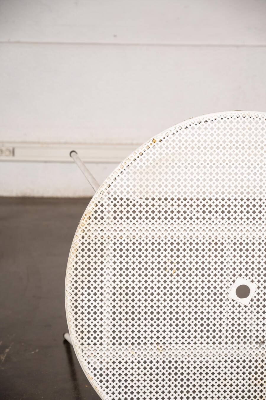 Perforated metal garden table