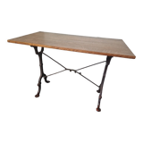 Bistro table with cast iron base and oak top
