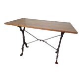 Bistro table with cast iron base and oak top