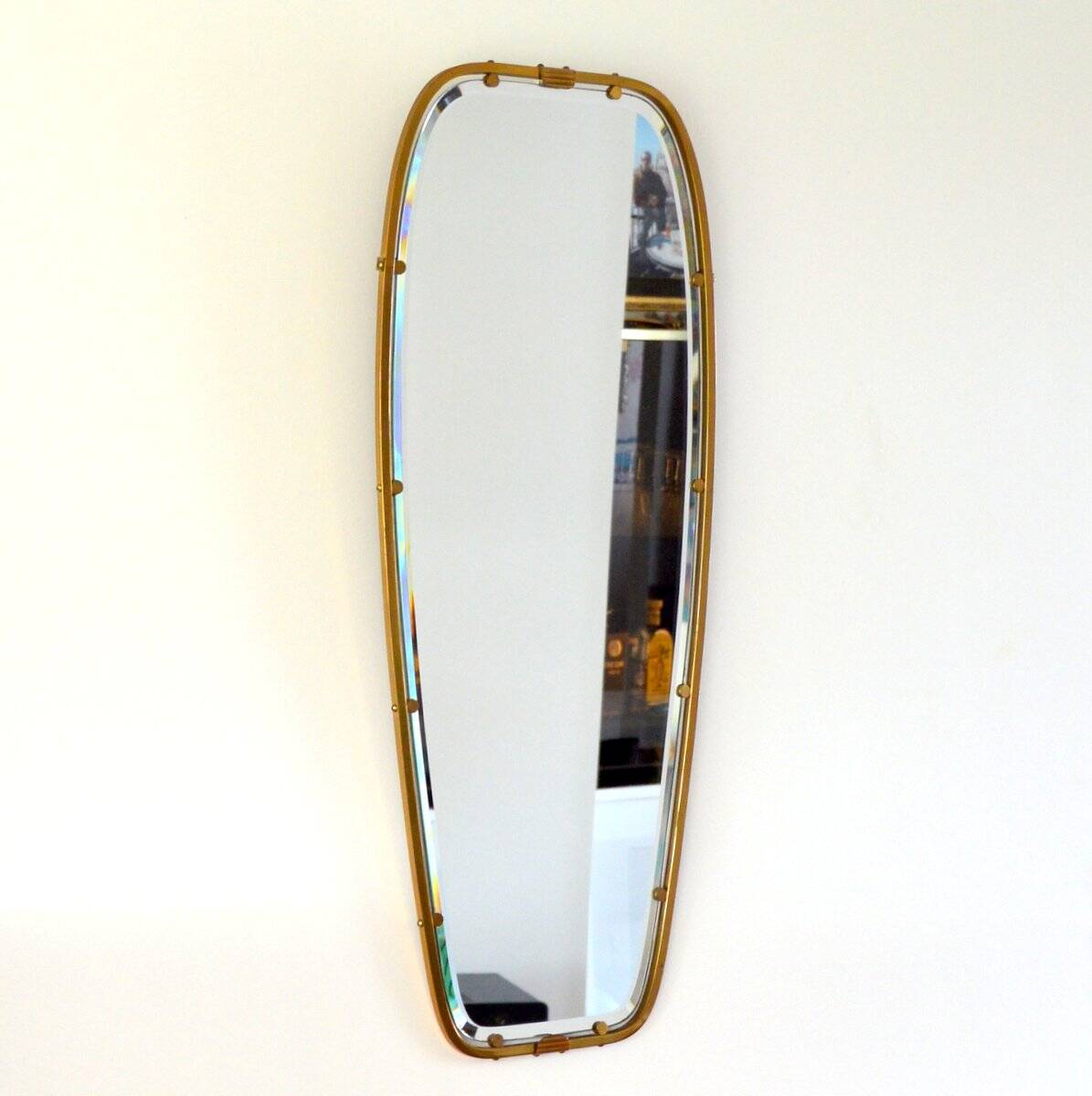 Superb free-form mirror in solid brass from the 50s/60s vintage.