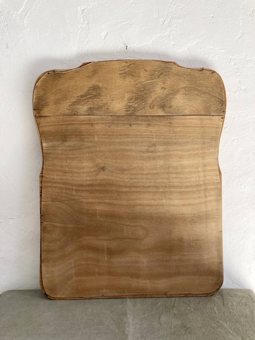 Art nouveau mirror, curved wooden frame and chiseled glass