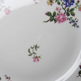4 flat plates by Bernardaud, Limoges porcelain, floral decoration from the 1920s to 1950s.
