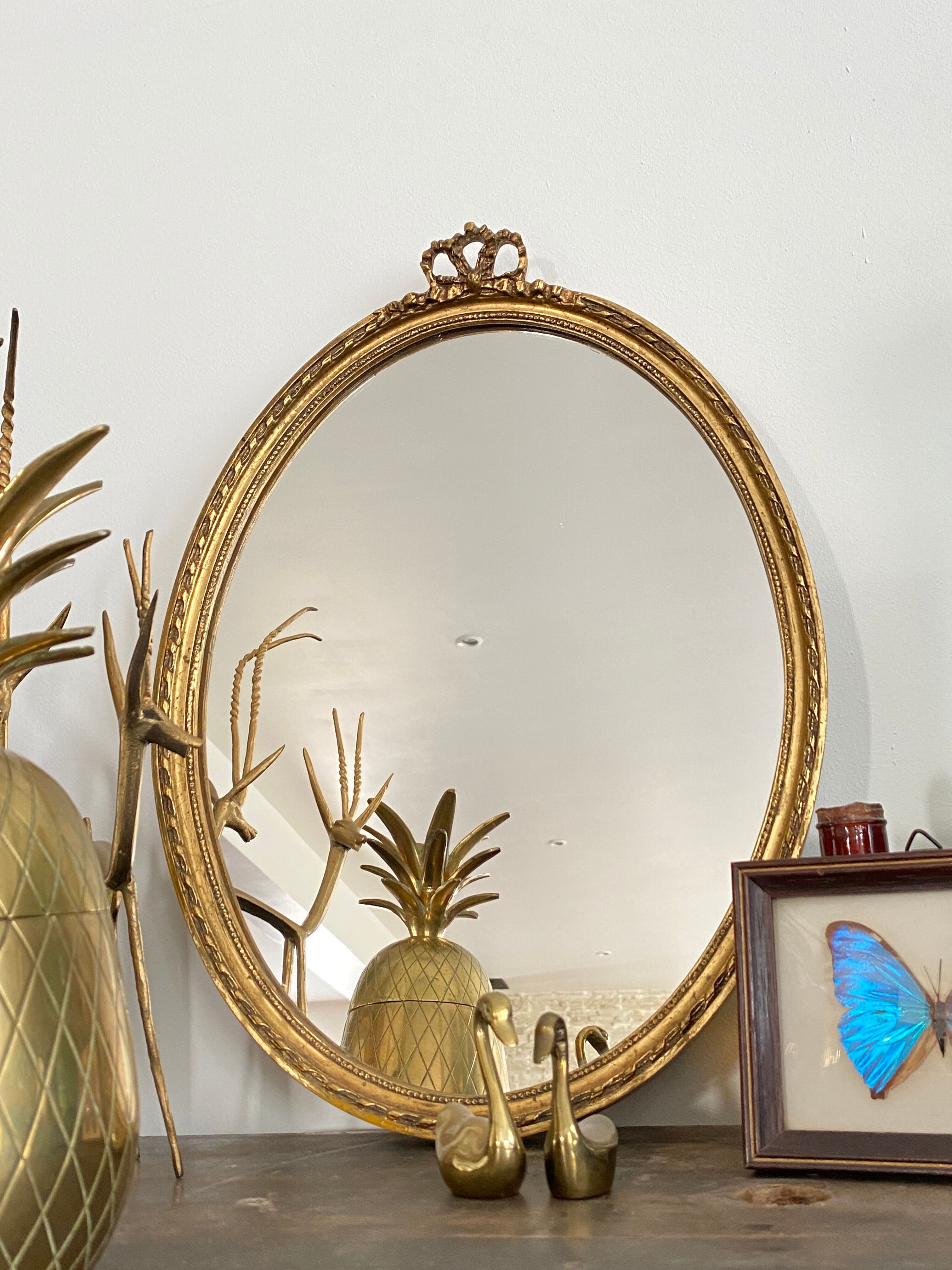 Golden oval mirror 32x44cm