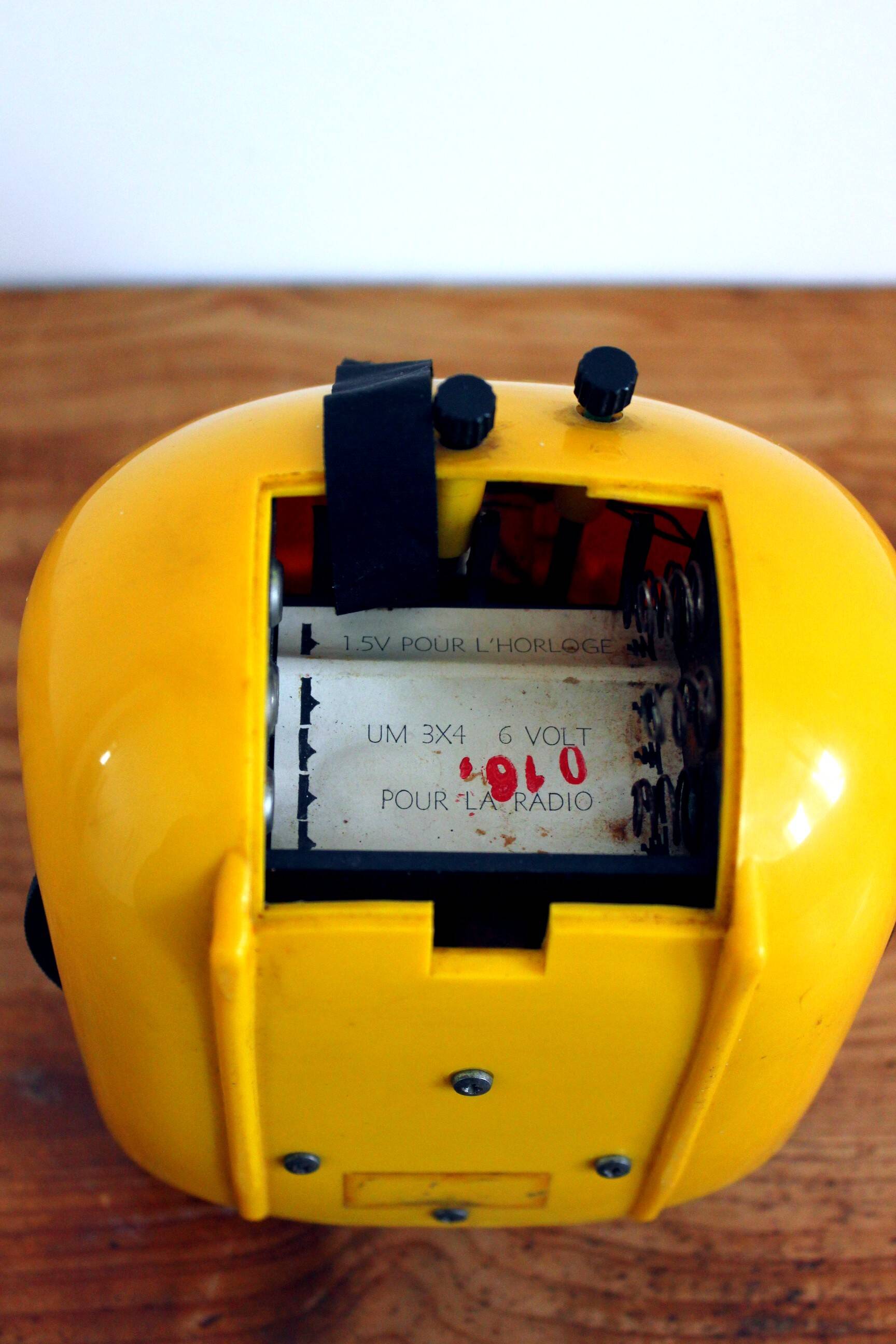 Japy yellow vintage space age alarm clock radio from the 70s