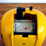 Japy yellow vintage space age alarm clock radio from the 70s