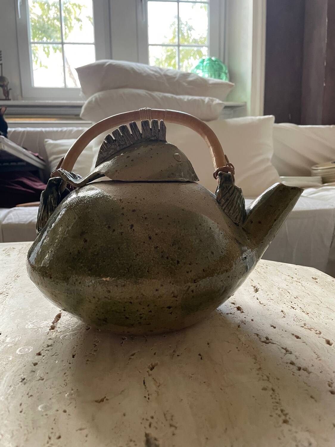 Handmade ceramic teapot with green fish and bamboo