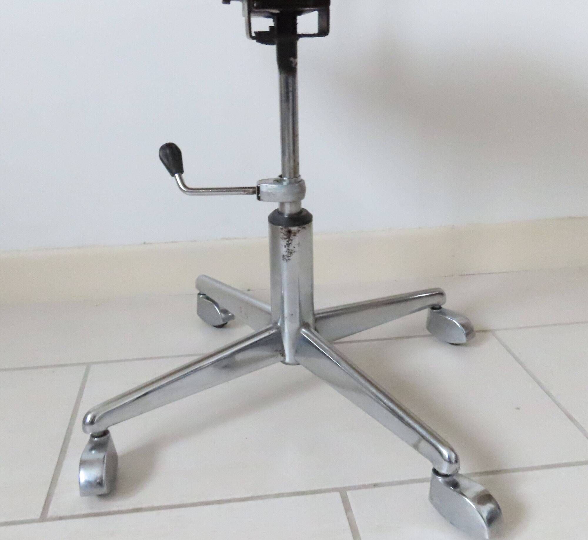 Eurosit vintage industrial workshop chair in chromed metal and orange imitation leather