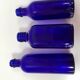 Trio de bouteilles bleues de pharmacie