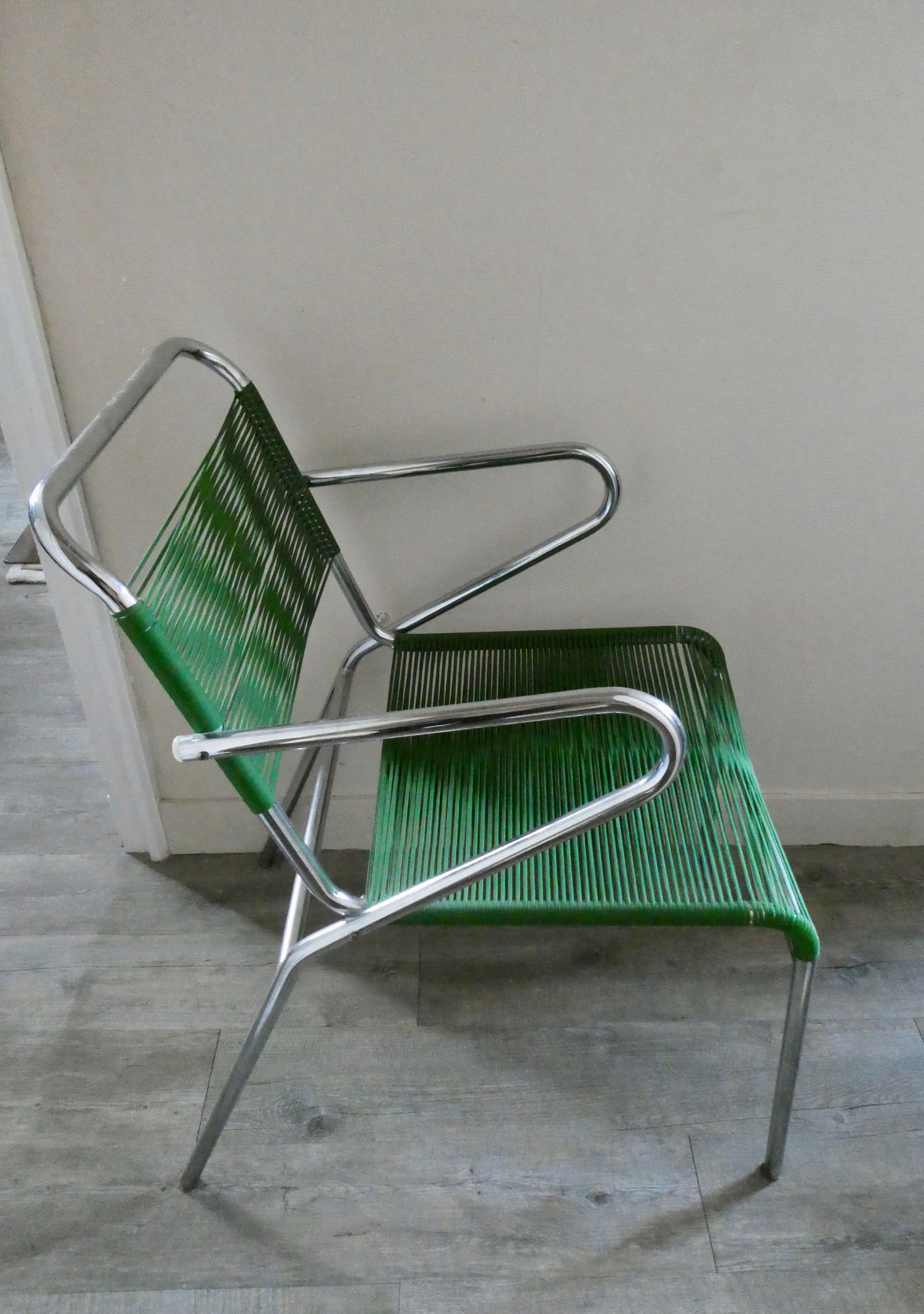 Metal chair and ropes