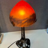 Contemporary mushroom lamp, wrought iron base and orange glass shell with blue hues in the art deco style